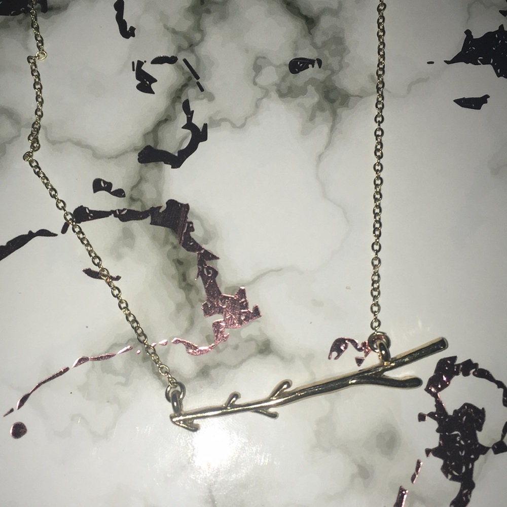 An arrow branch necklace